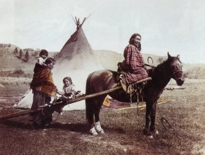 Julia Tuell took this photo of a family and horse travois on the Northern Cheyenne Reservation in 1906. She identified the woman on the horse as Strong Left Hand. Courtesy of Buzz Tuell, Tuell Pioneer Photography 
