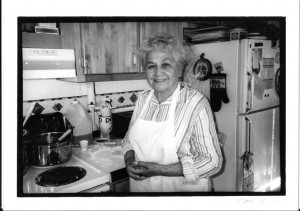 Author of ?A Taste of Heritage, Crow Indian Recipes and Herbal Remedies? and ?Grandmother's Grandchild: My Crow Indian Life,? Alma Snell poses in her kitchen, circa 1998. © Kristin Loudis 2013