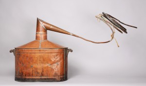 Made of copper, rope, and wood, this ca. 1920 bootlegger’s still is in the Montana Historical Society’s collection. MHS Museum 1987.43.01 a-c, Gift of Anna and George Zellick