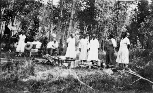Members of Pleasant Hour Club, including  the club's founder Mamie Bridgewater (third from right) and her daughter Octavia (far right) picnic in Colorado Gulch west of Helena, ca. 1926. Octavia, who graduated from Helena High School in 1925 and then attended the Lincoln School of Nursing in New York, served as an army nurse during World War II. MHS Photo Archives PAc 2002-36.11