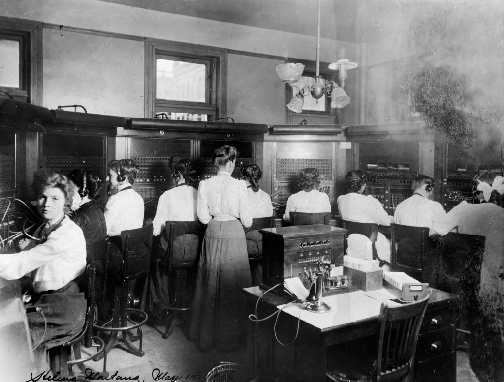 Switchboard operators at work in Helena in 1906 included chief operator Anna Bennett (standing) and, from left to right, Elizabeth Hartwig, Irene LaSalle, Susie Hildebrand, Elma Barnes, Tillie Gillan, Susette Amacker, Kate J. Merrill, Rose Lacking, and Jennie Stoehr.
