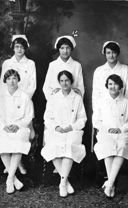 In 1927 Susie Walking Bear (seen here, back row, center, with her graduating class from the Boston  City Hospital's School of Nursing) became the first member of the Crow Nation and one of the first Indians in the country, to become a registered nurse. 