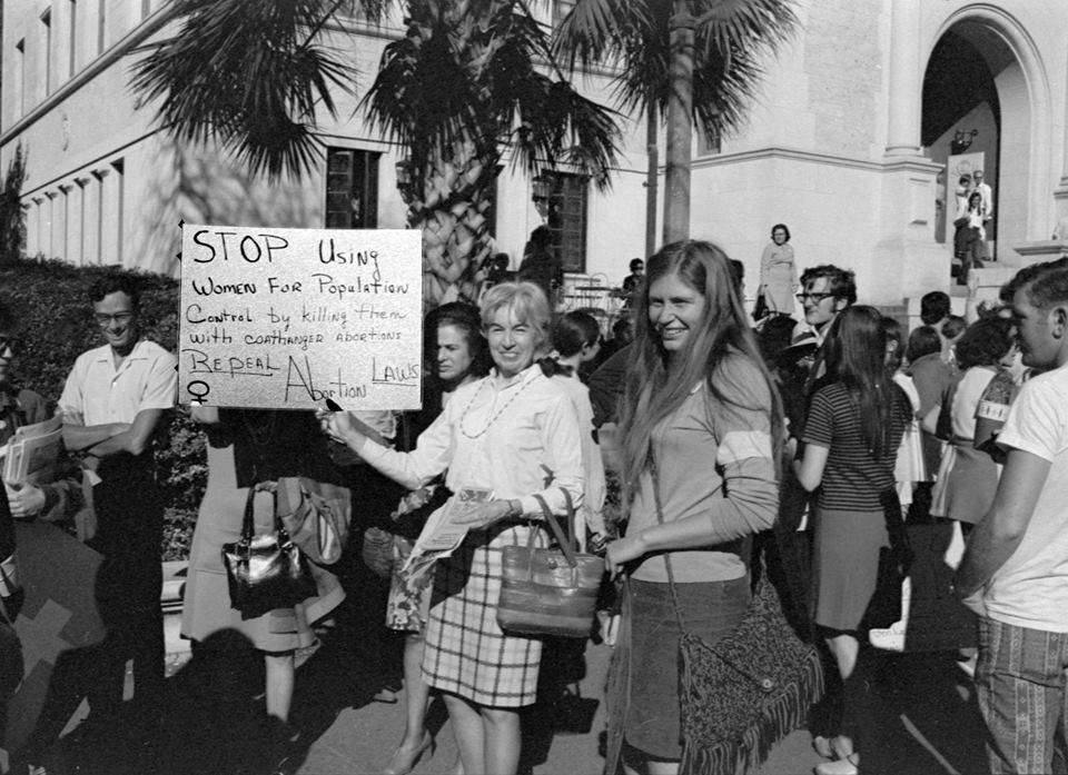 Before moving to Missoula, Judy Smith was active in the feminist movement in Texas.  She poses here with her mother at the first Texas statewide women’s reproductive rights conference at the University of Texas Student Union in Austin in 1974