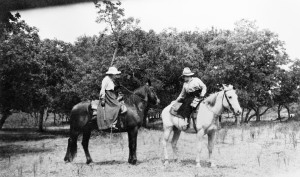 Western author Bertha M. Bower (left) rides side saddle along the Tongue River in 1917, accompanied by Nancy Russell's sister, Jean Ironside. MHS Photo Archives 941-206.