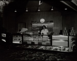 Young woman (and WPU member) behind the candy counter of Butte's Rialto Theatre