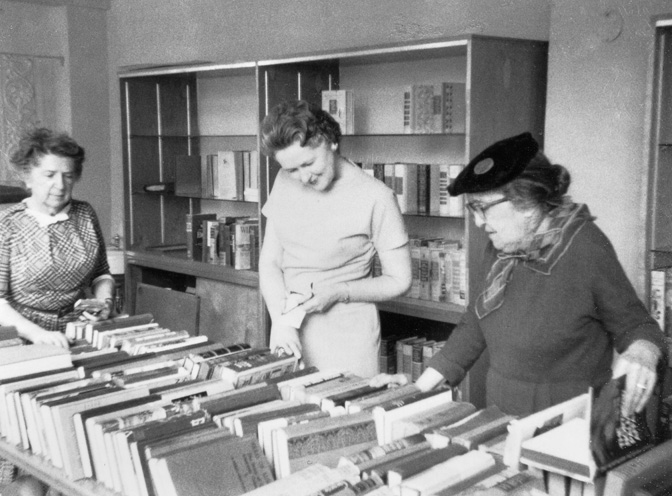 Both Fligelman sisters were lifelong activists and involved in many organizations including the League of Women Voters and the American Association of University Women. They are shown here with Mrs. Garrett (center) at the 1963 Helena AAUW book sale. PAc 90-20 f5 booksale 1963