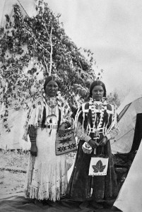A mother and daughter in ceremonial dress on the Flathead Reservation in July 1906.