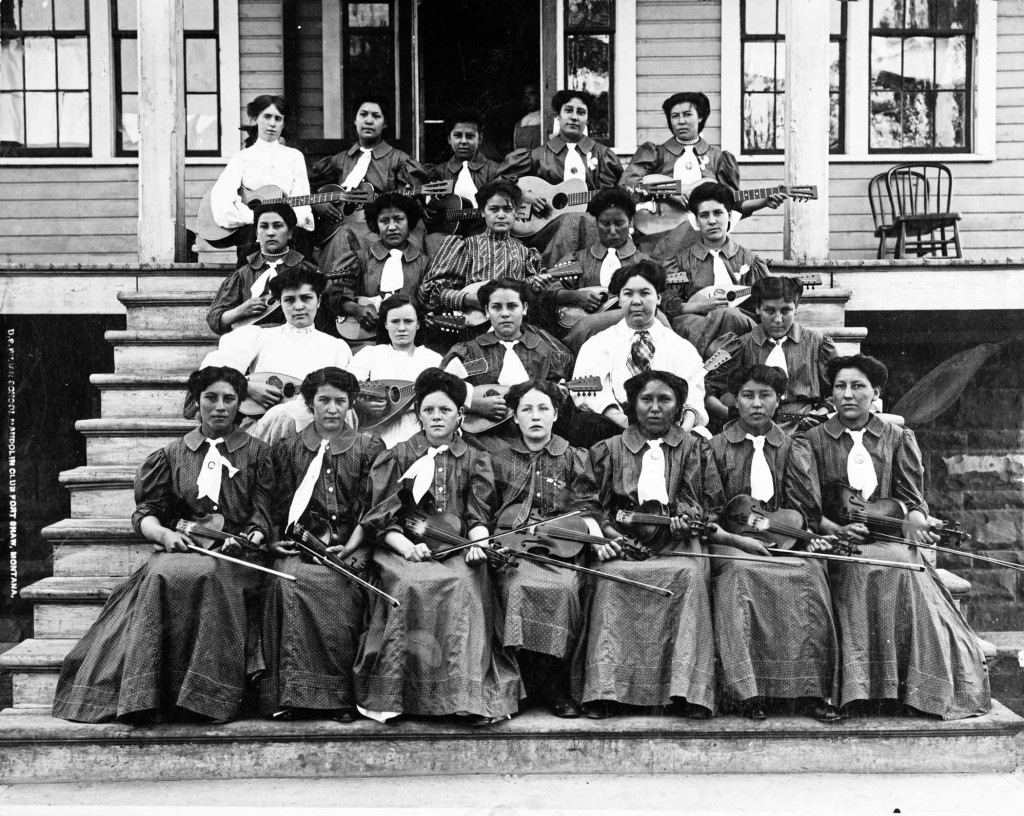 Cultural assimilation was the primary objective of off-reservation boarding schools such as Fort Shaw. Thus, spectators at Fort Shaw’s basketball games were also treated to performances of the school’s mandolin club, shown here at the school with a variety of stringed instruments. 