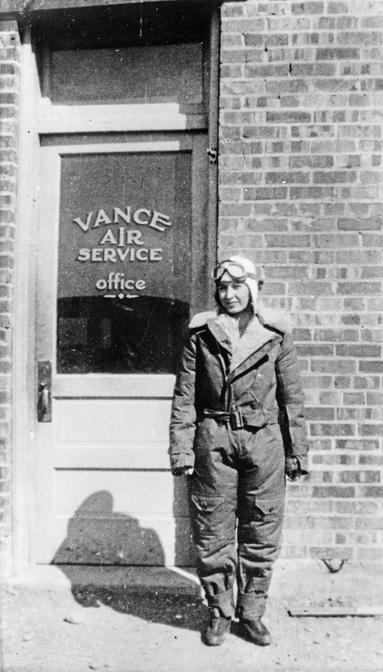 Esther Combes Vance in her flight suit at the Vance Airport, Great Falls, Montana, 1930