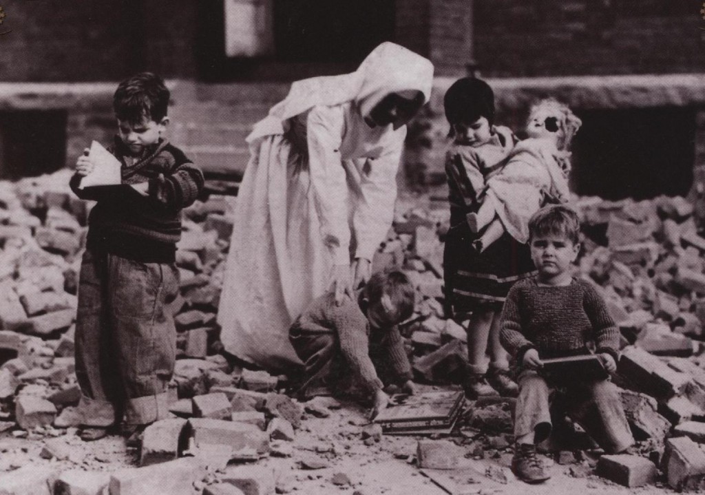 A nun and children looking through the rubble after the 1935 Helena earthquake.