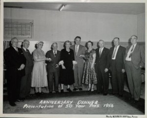 While in some communities, strong women's auxilliaries actively promoted community unionism, in Butte, organizations like the Carpenter's Union Ladies Auxilliary functioned more like a middle-class women's club. Members here are pictured with their husbands, who are receiving their fifty year pins. Collection LH067, Carpenters Union Ladies Auxiliary Local 222, Butte-Silver Bow Public Archives.