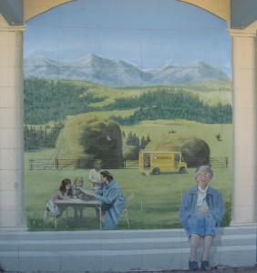 The mural outside the Eureka library commemorates Inez Herrig's contributions to Lincoln County, featuring a portrait of her in the foreground and the bookmobile she used to serve rural patrons in the background. Photo courtesy of www.bigskyfishing.com.