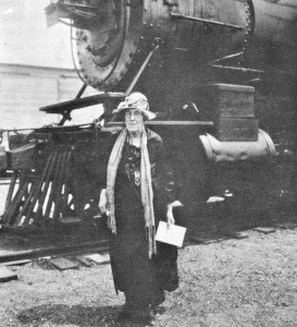 Martha Plassman standing in front of a train